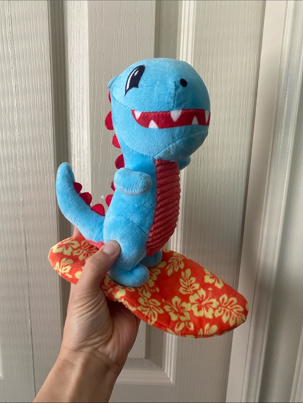 Bow-Wow Dog Blue Plush Dinosaur on Orange Floral Surfboard